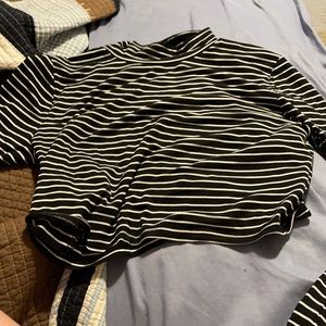 It’s a black and white crop top.